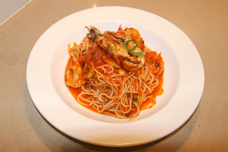 Wood-fired pizza oven centrepiece at Gambinos.